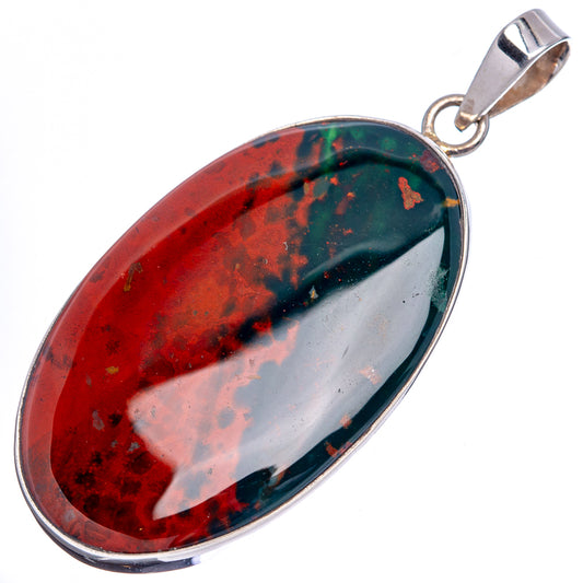 Bloodstone oval pendant with silver border, glossy red-and-green speckled stone face