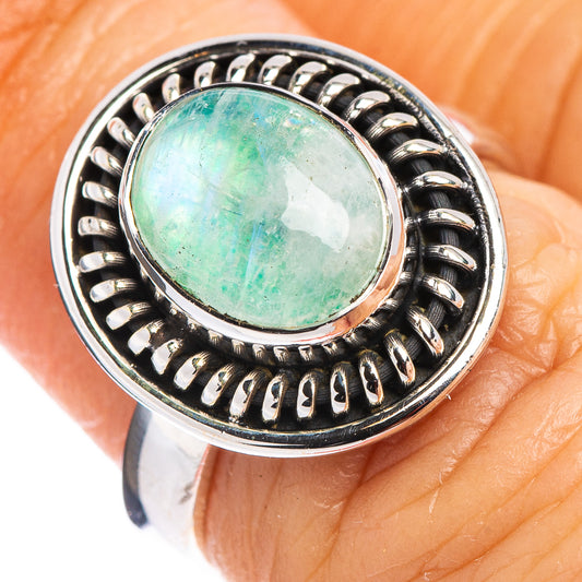 925 sterling silver ring with oval green moonstone cabochon and scalloped bezel detail