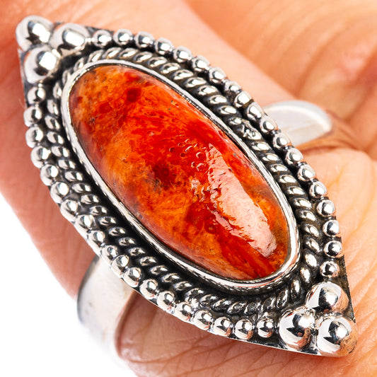 Coral sponge ring in .925 sterling silver, oval orange stone in silver bezel