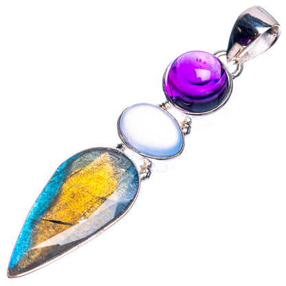 925 sterling silver pendant with purple and white cabochons and blue teardrop stone