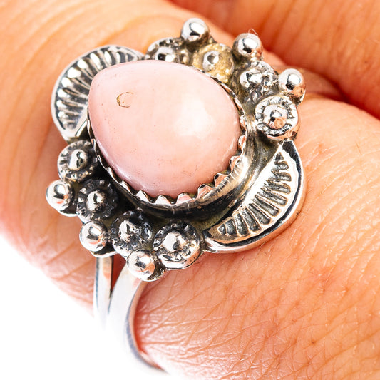 Pink opal native style sterling silver ring with oval pink stone, beaded halo
