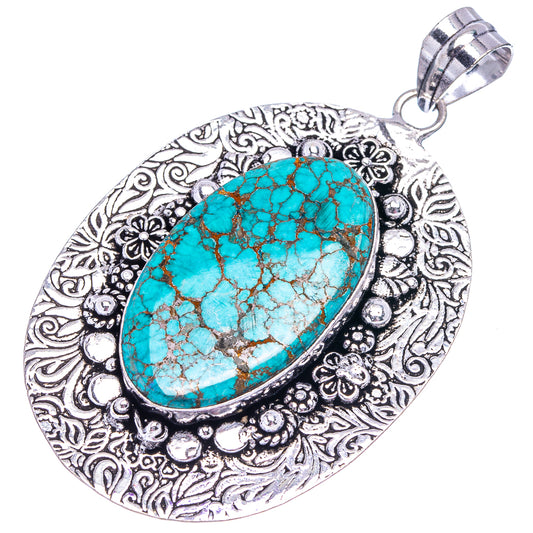 German silver turquoise oval pendant with decorative border and top loop bail
