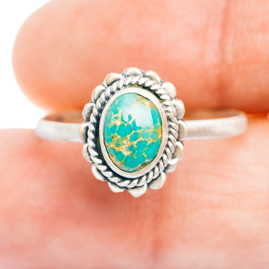 Turquoise oval cabochon sterling silver ring with ornate silver oval bezel