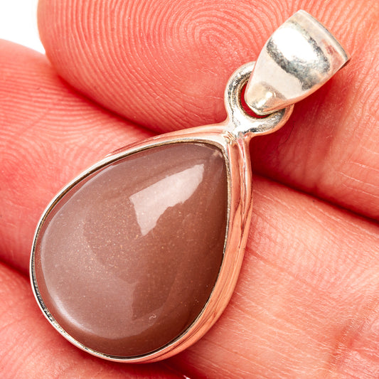 Teardrop peach moonstone pendant with polished 925 sterling silver bail