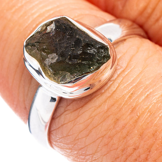 Sterling silver ring with rough dark green Moldavite stone in bezel setting