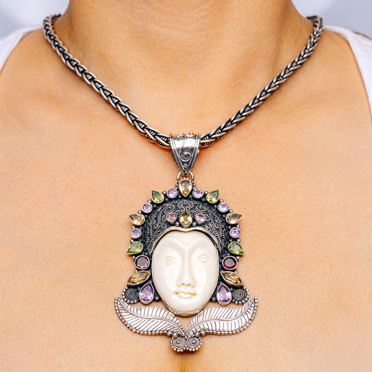 Sterling silver goddess pendant necklace with carved ivory-style face and colorful gems