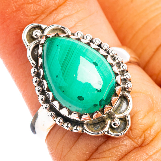 Sterling silver malachite ring with oval green cabochon and beaded bezel