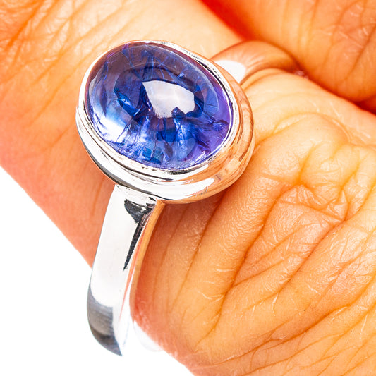 Oval blue tanzanite stone sterling silver bezel ring with rounded band