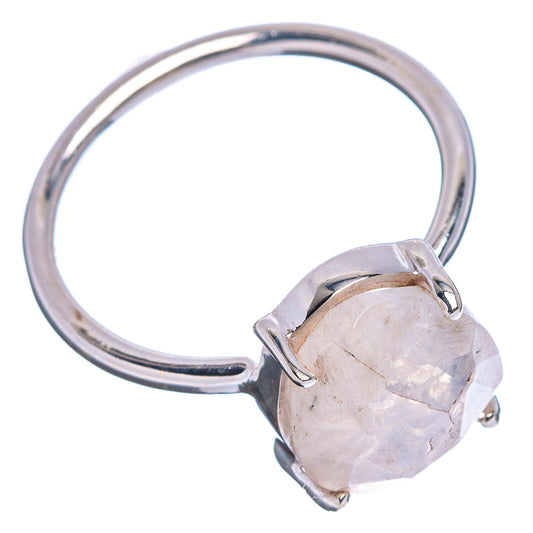 Sterling silver ring with oval moonstone in hinged prong setting, side view.
