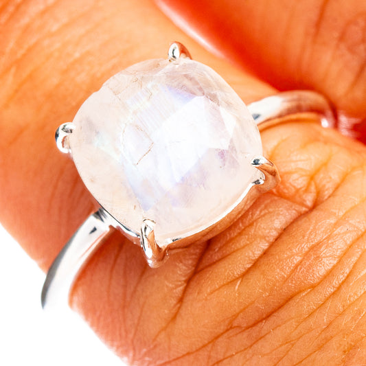 Faceted moonstone ring with oval clear stone in four-prong sterling silver setting