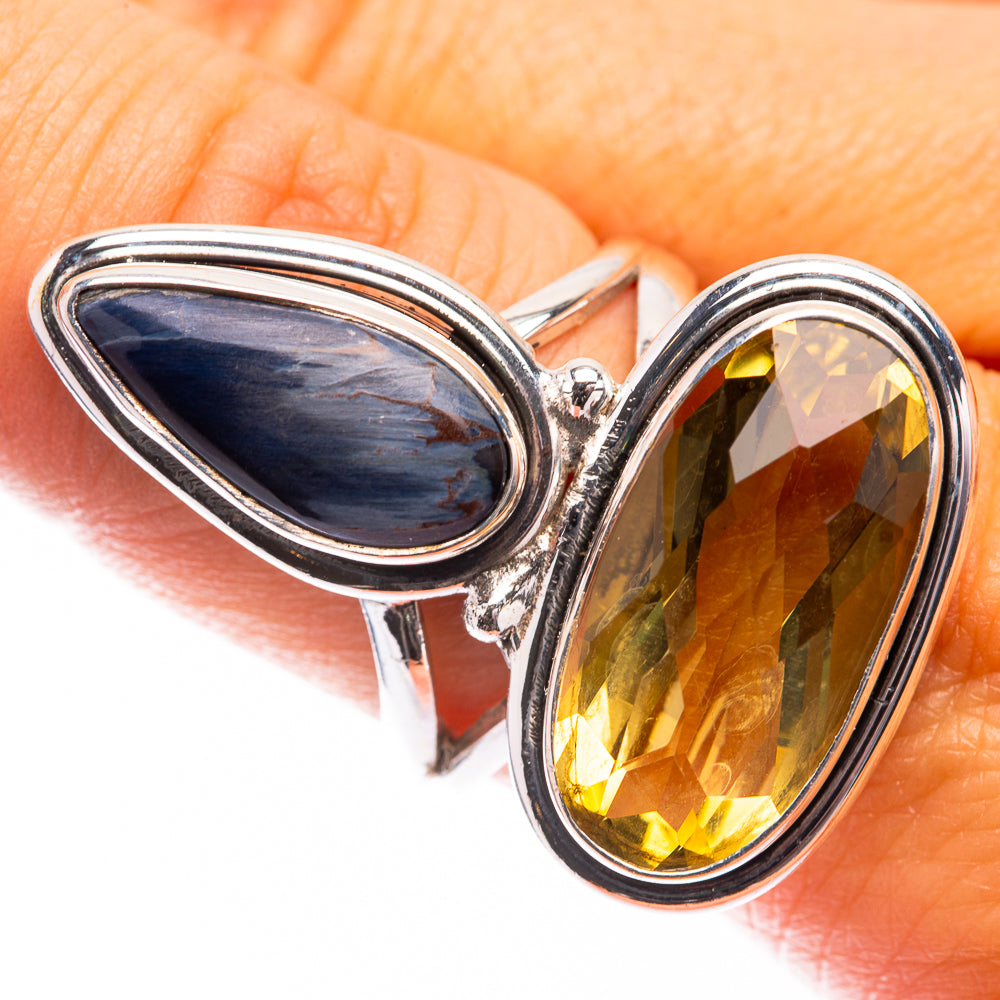 Sterling silver ring with oval dark blue stone and oval yellow citrine stone, double set