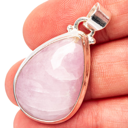 Kunzite teardrop pendant in .925 sterling silver with pink stone bezel and bail