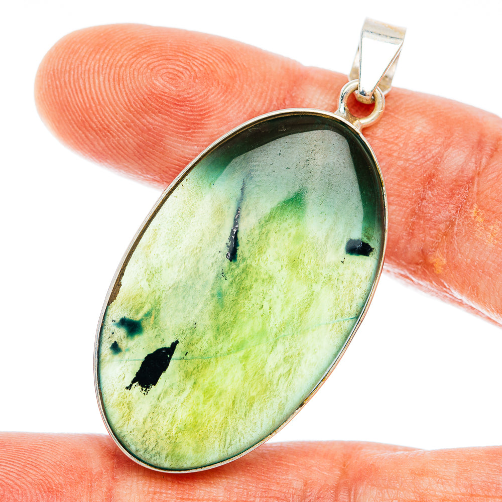 Nephrite jade oval pendant with green marbled stone, .925 sterling silver bezel