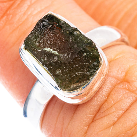 Sterling silver ring with irregular green moldavite stone, wide bezel setting