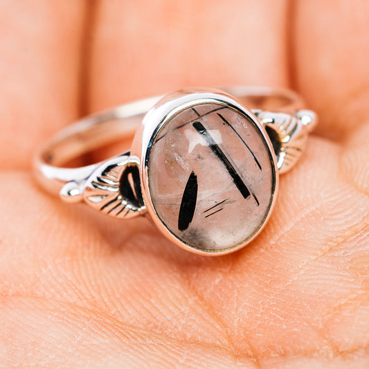 Sterling silver ring with oval tourmalinated quartz and ornate side details