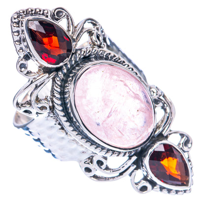 Size 7 sterling silver ring with oval pink morganite center and two red garnet stones