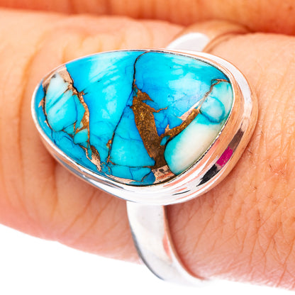 Sterling silver turquoise inlay ring with oval blue stone and gold matrix detail