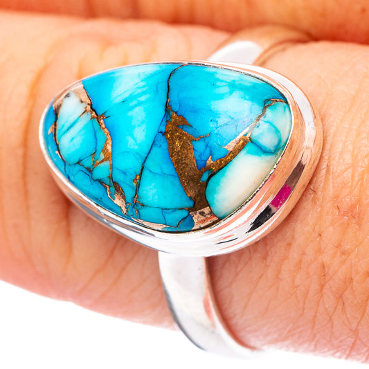 Sterling silver turquoise inlay ring with oval blue stone and gold matrix detail