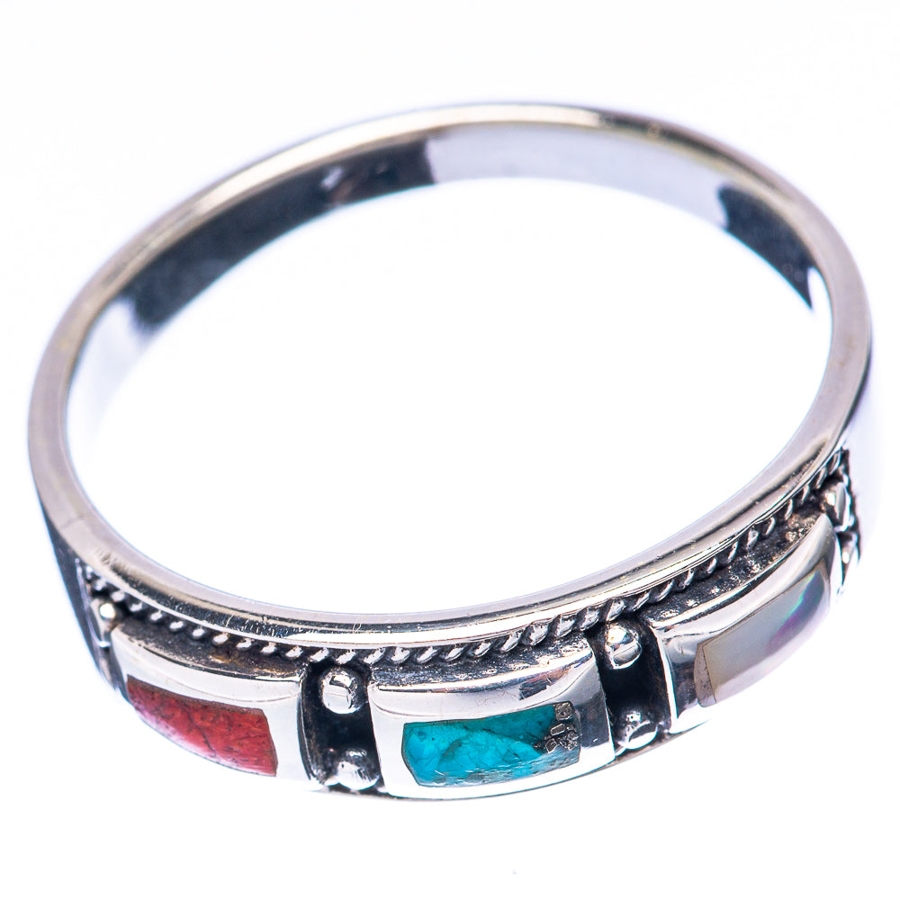 Sterling silver band ring with turquoise centerpiece and red side stone