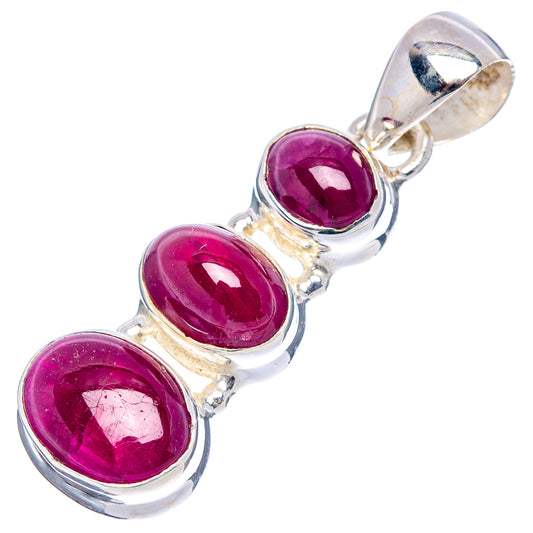Sterling silver pendant featuring three oval purple gemstones, side view with bail