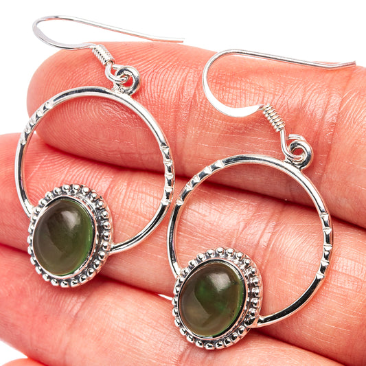 Sterling silver hoop earrings with oval green jade cabochon bezel