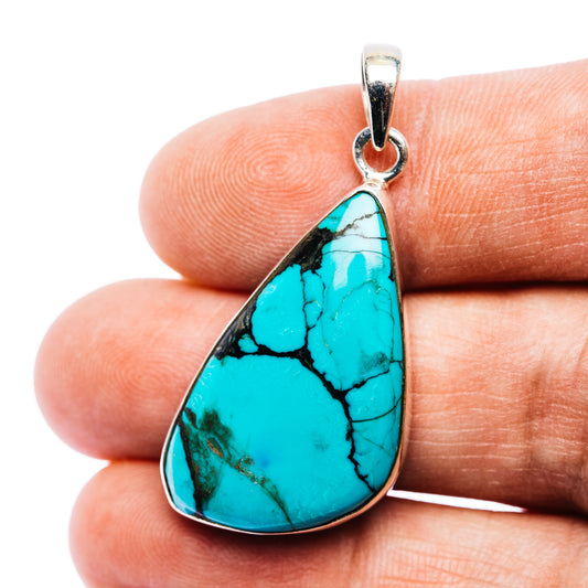 Sterling silver teardrop turquoise pendant with textured stone and loop bail