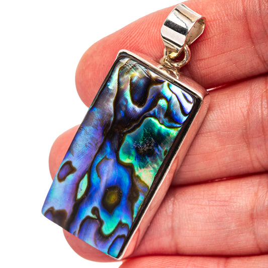 Iridescent abalone shell pendant, blue/green with .925 sterling silver bezel