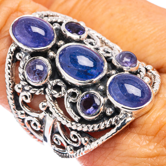 Sterling silver tanzanite ring with oval blue gemstones and ornate filigree band, size 9