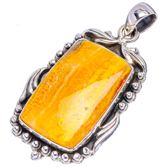Sterling silver bumblebee jasper pendant with rectangular cabochon and rope-edge frame.