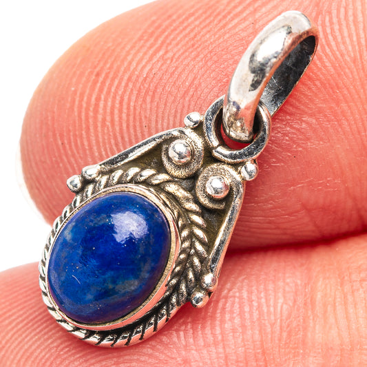 Oval lapis lazuli pendant with .925 sterling silver ornate setting and open bail