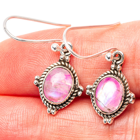 Pink moonstone drop earrings in .925 sterling silver, oval cabochons with textured bezel.