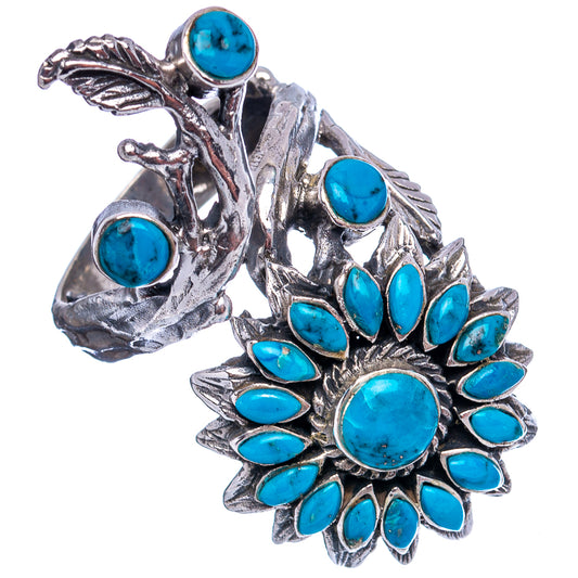 Turquoise flower ring with round blue center stone and silver petal settings