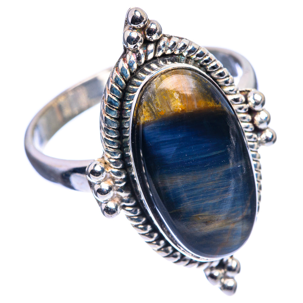 Pietersite oval ring with blue-gold striped stone, silver prong setting, openwork beads