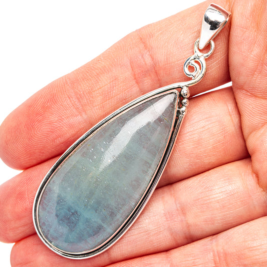 Aquamarine teardrop pendant in .925 sterling silver with silver bezel and bail