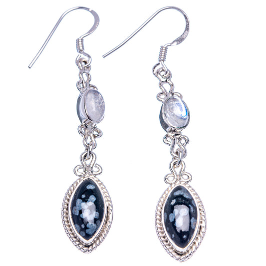 Sterling silver drop earrings with oval black stone and opalescent pale moonstone