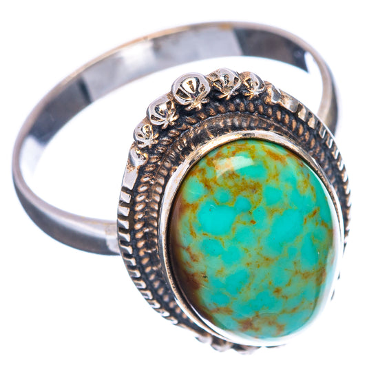 Sterling silver turquoise ring with oval stone and carved band side view