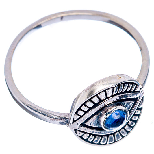 Sterling silver eye ring with blue oval gemstone, openwork band, size 7.75