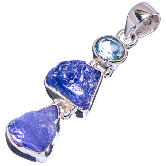 Sterling silver pendant with bail, round blue topaz, and two purple tanzanite rough stones