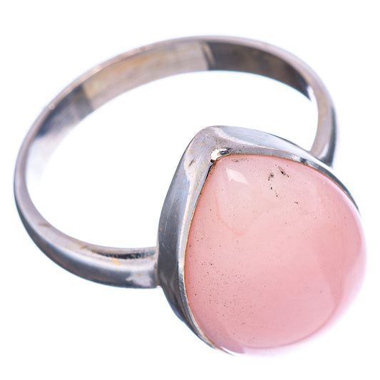 Sterling silver ring with pink round opal cabochon and open band
