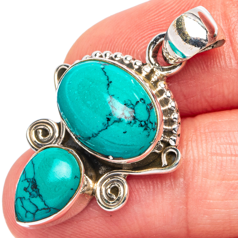 Turquoise howlite pendant with two oval cabochons in 925 sterling silver bezel