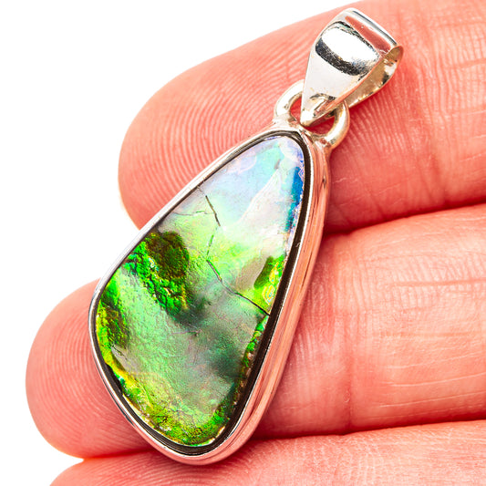 Teardrop sterling silver ammolite pendant with iridescent green-blue stone in bezel