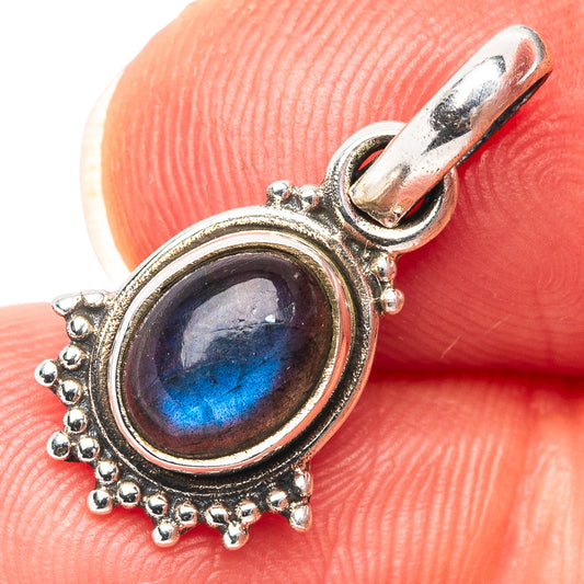 Oval labradorite gemstone pendant in .925 sterling silver bezel with dangling bail