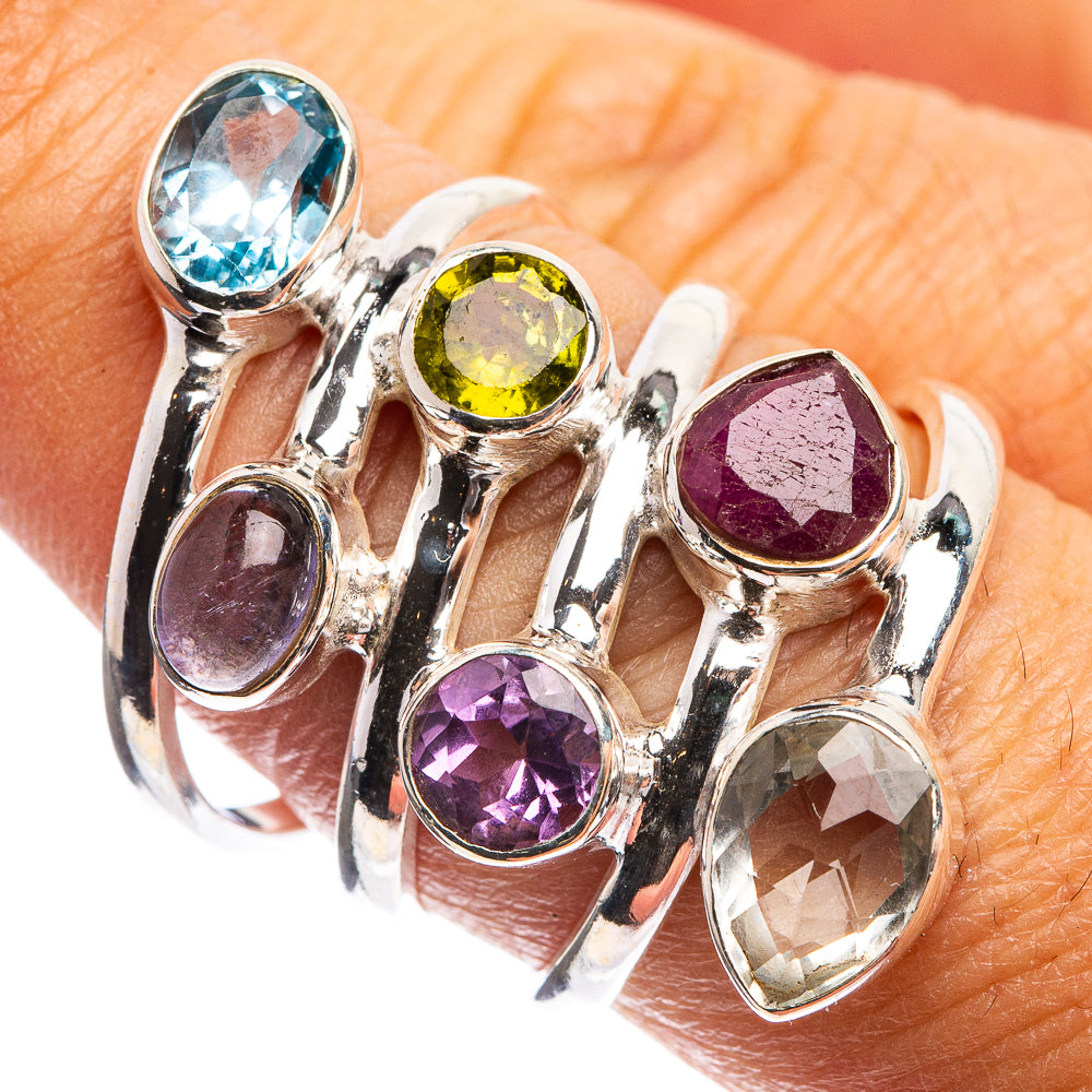 Sterling silver gemstone ring with oval blue, yellow, purple, red, and clear stones