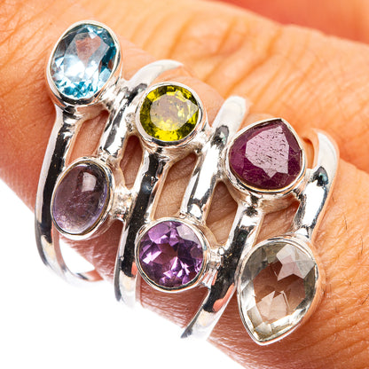 Sterling silver gemstone ring with oval blue, yellow, purple, red, and clear stones