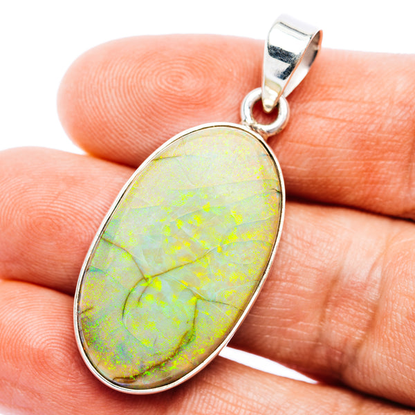 Sterling silver opal pendant with oval green-yellow opal and polished bezel