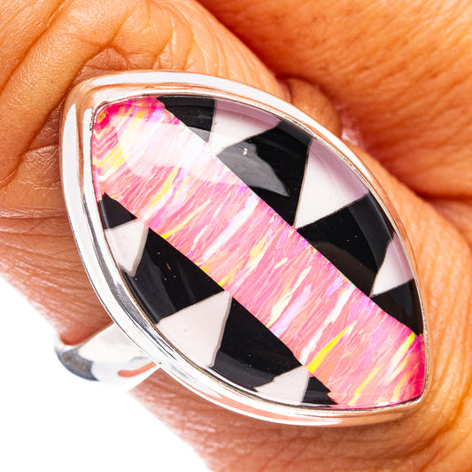 Sterling silver ring with pink opal teardrop gemstone and black check pattern.