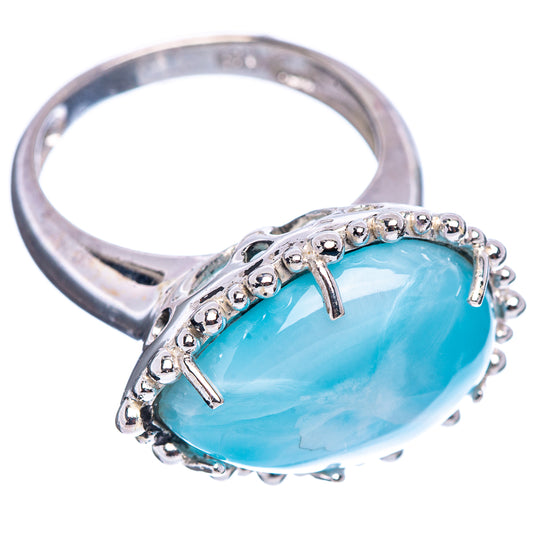 Sterling silver larimar ring, side view, oval light-blue cabochon in bead bezel