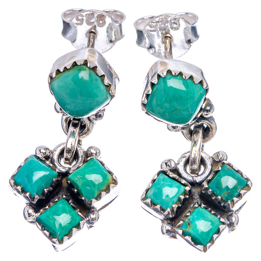 Sterling silver dangle earrings with round green turquoise tops and square turquoise clusters