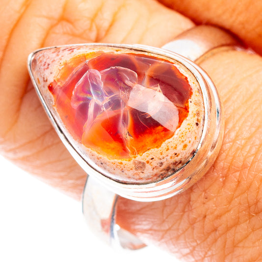 Sterling silver ring with teardrop fire opal in orange-red and pink, size 10