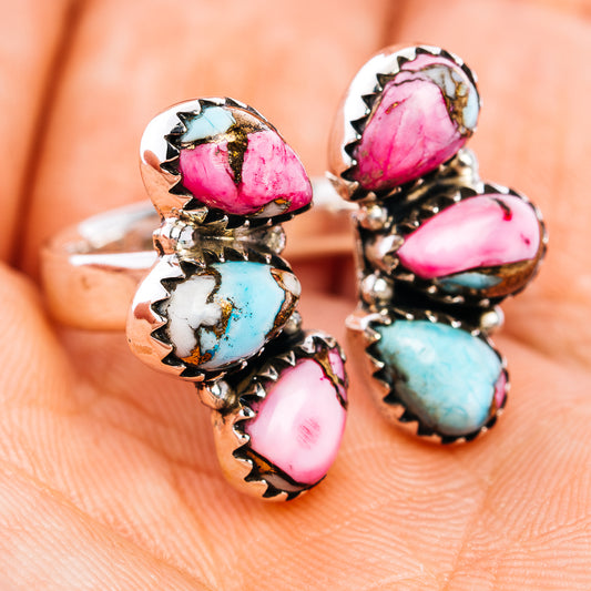 Southwestern style statement ring with five oval cabochon stones, pink and turquoise, silver